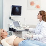 врач ультразвуковой диагностики и пациентка
